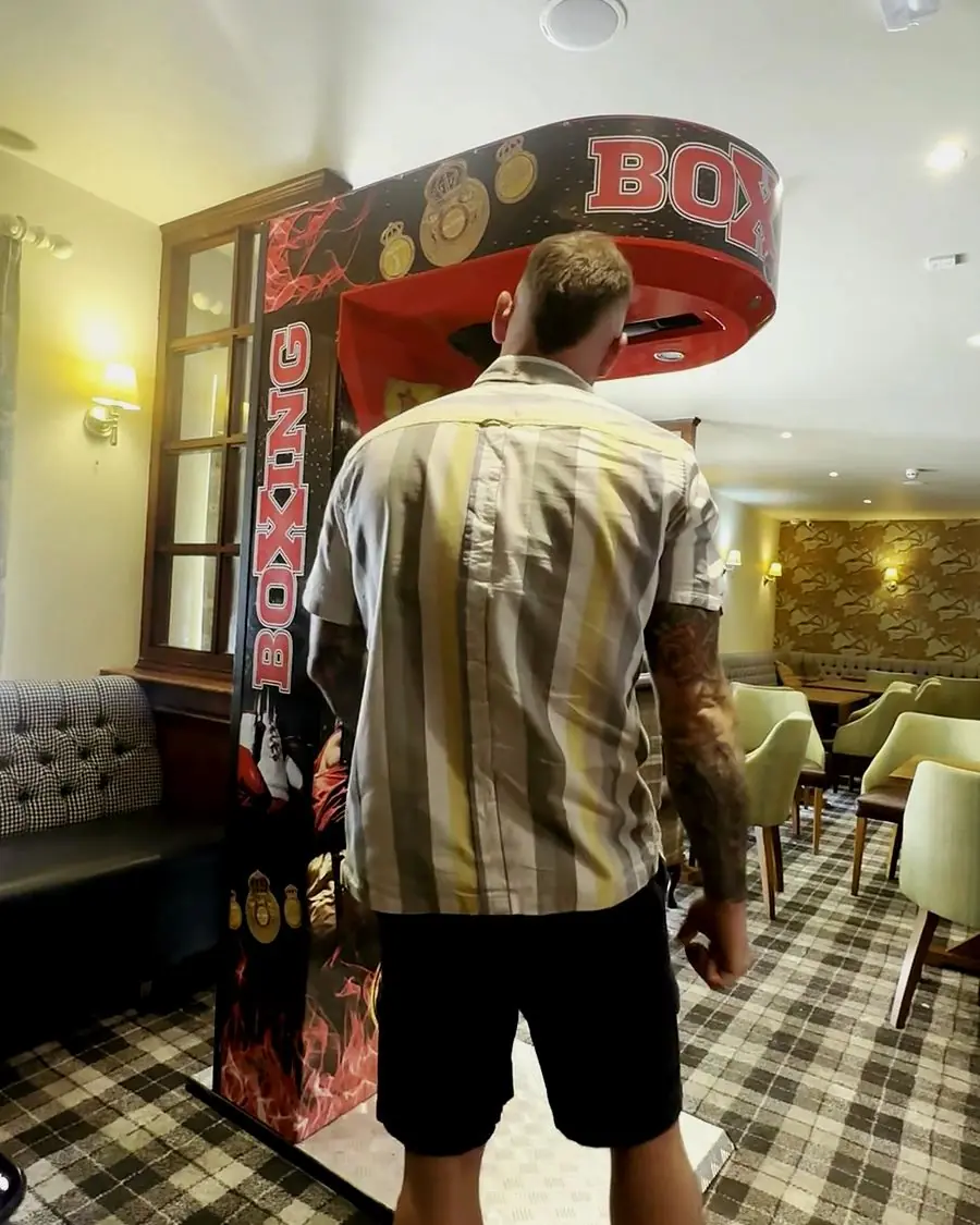 Boxing machine installed in a pub, of the type Haymaker Arcade places in Manchester venues