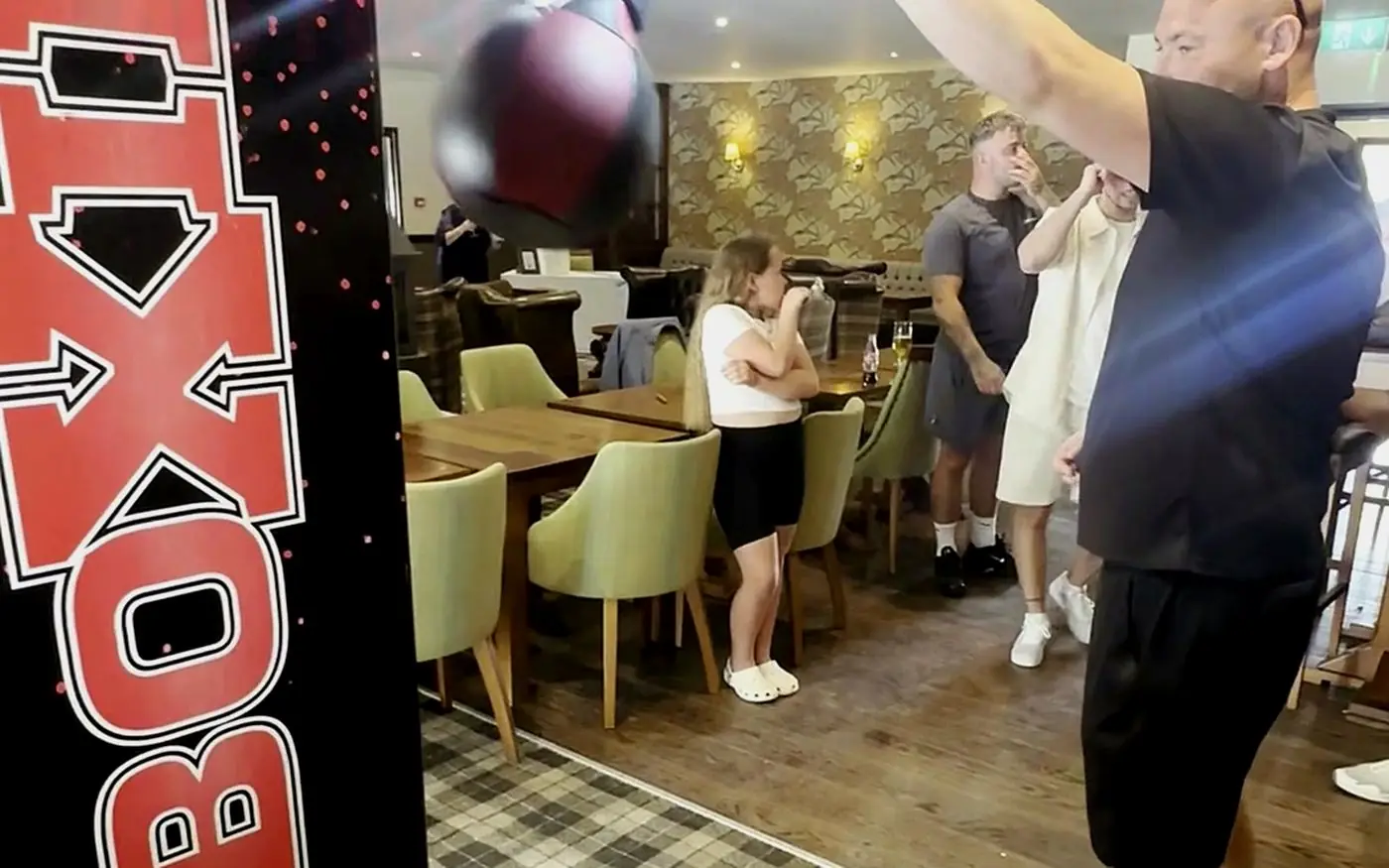A Haymaker boxing machine installed in a wide function room, the kind of space we cover across the UK